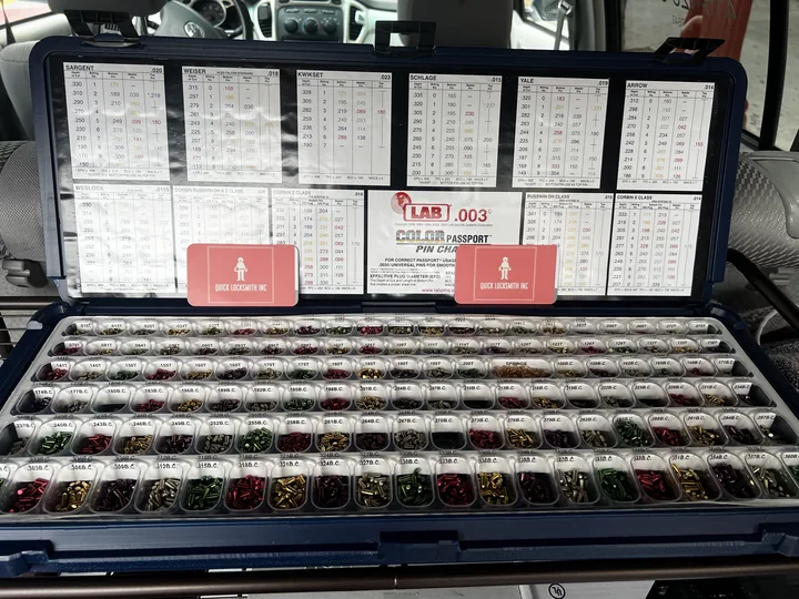 An open pin kit with the pinning charts for every major lock brand